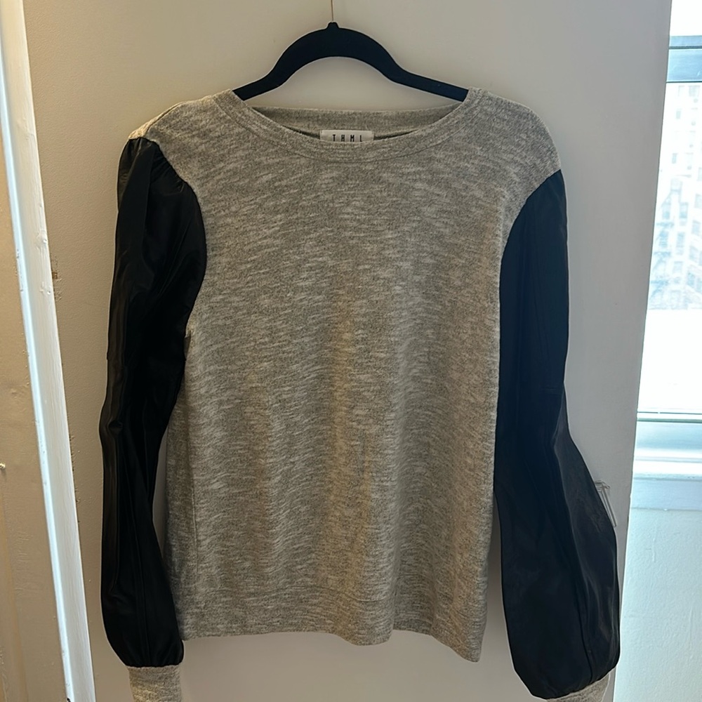 Sweater with faux leather sleeves
